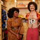 (from left) Quinta Brunson as Oprah Winfrey and Daniel Radcliffe as Al Yankovic in Weird: The Al Yankovic Story.